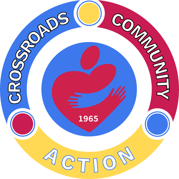 The logo shows "Crossroads Community Action" with a heart and hands symbol.